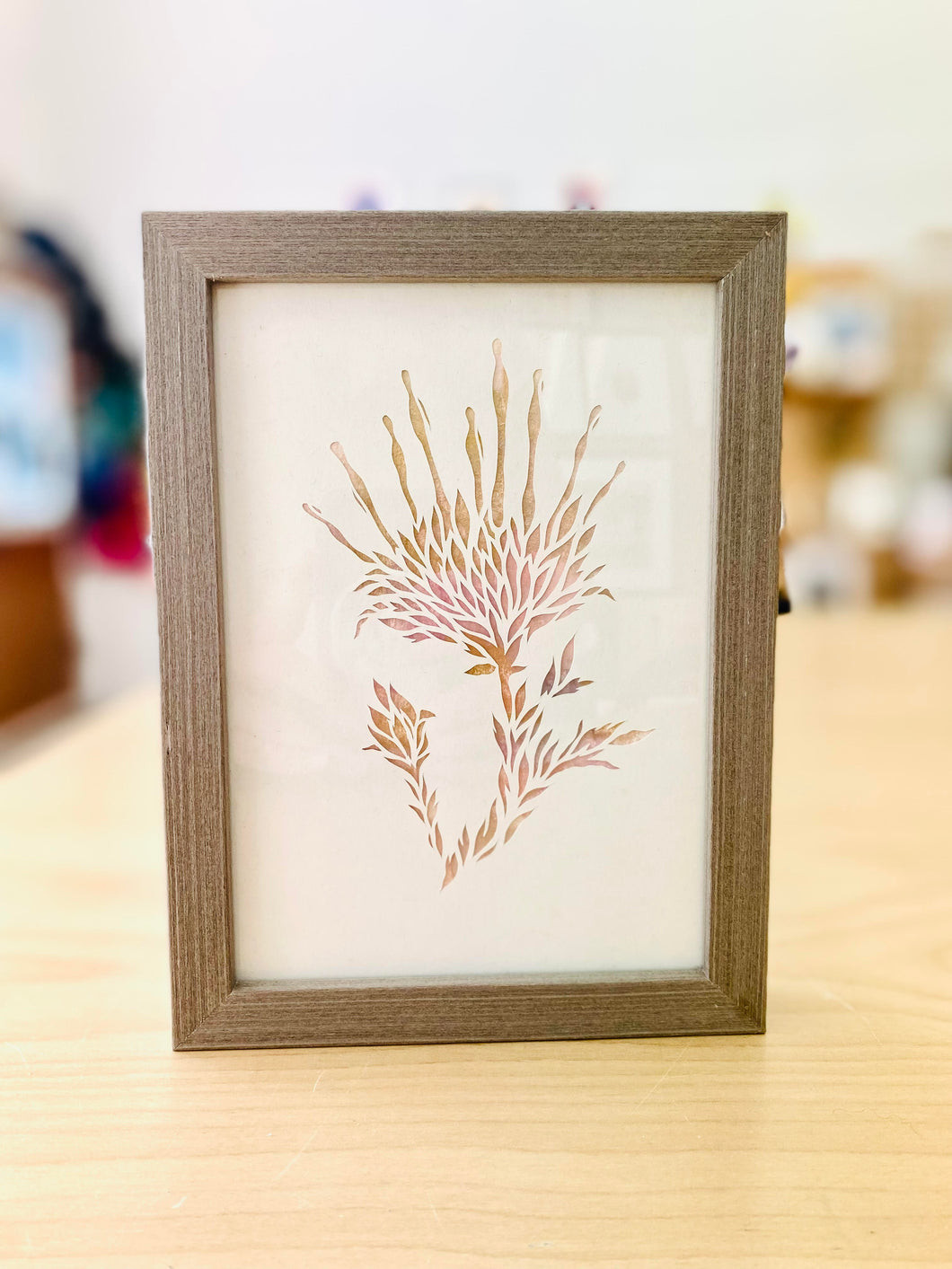 Shimmer floral paper-cut over watercolor